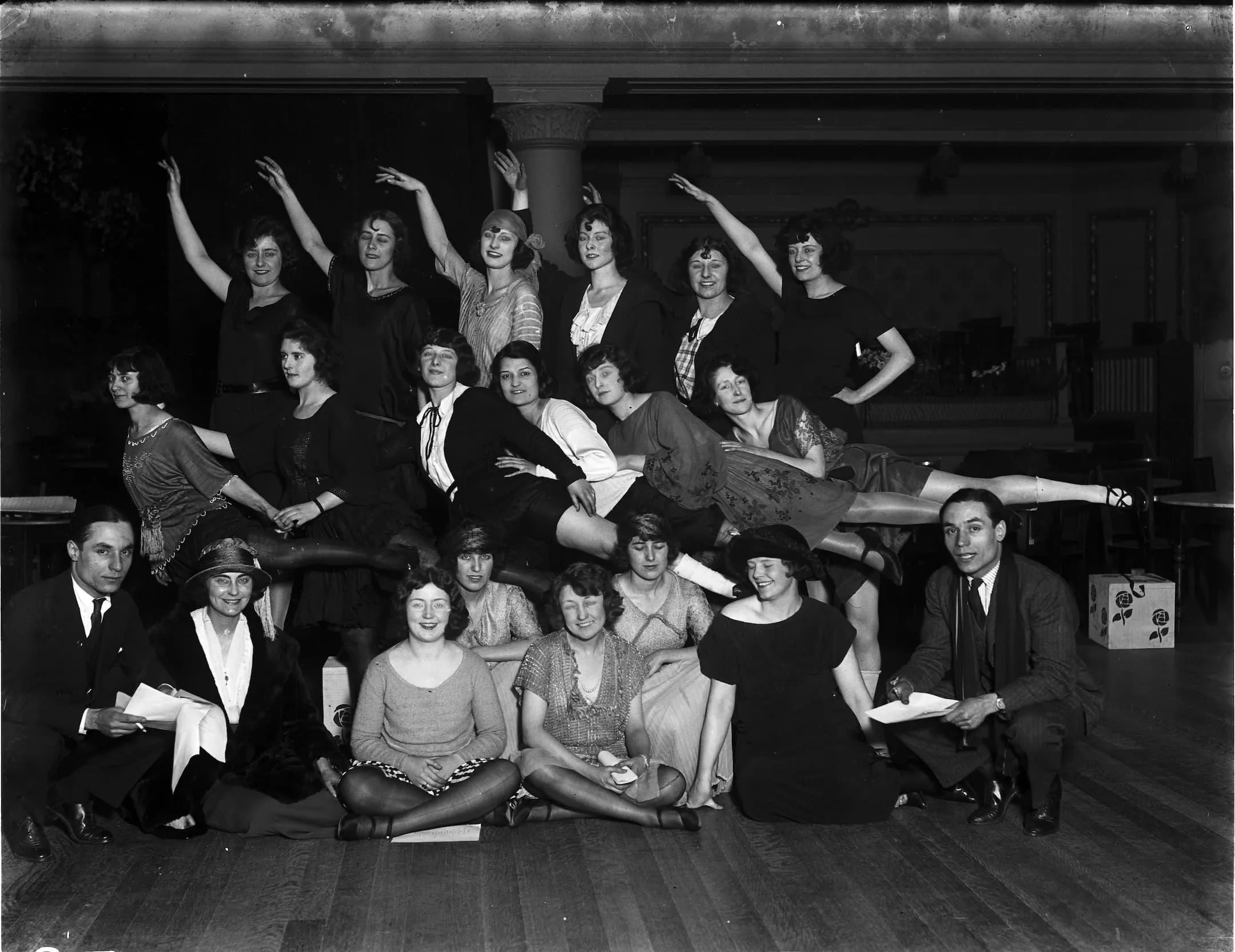 Follies at Grafton Galleries: group portrait of a drama troupe posing theatrically for the camera, 1923.