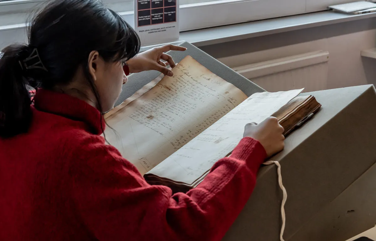 researcher-looking-at-large-archive-in-asa